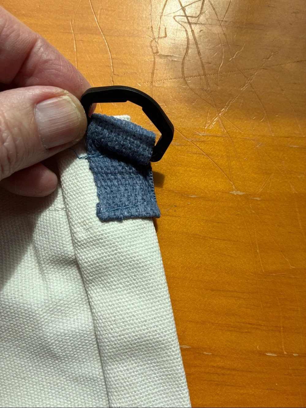 Stitch Canvas Tote in Cream with Blue Stitch Graphic. It’s a Crossbody bag too